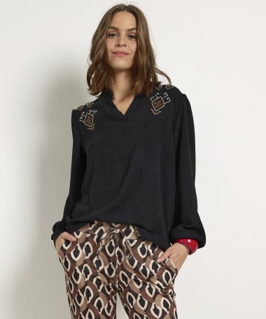 blouse met schouderborduursels